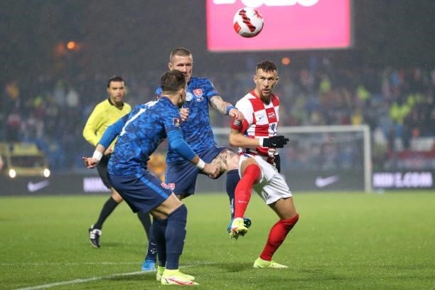 Juraj Kucka of Slovakia and Ivan Perisic of Croatia in action during the 2022 FIFA World Cup Group H Qualifier match between Croatia and Slovakia at...