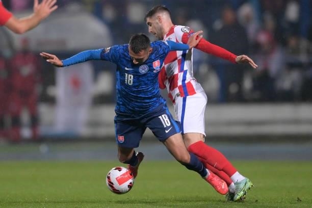 Luka Ivanusec of Croatia and Ivan Schranz of Slovakia in action during the 2022 FIFA World Cup Group H Qualifier match between Croatia and Slovakia...