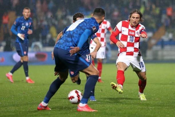 Luka Modric of Croatia passes the ball during the 2022 FIFA World Cup Group H Qualifier match between Croatia and Slovakia at Gradski Vrt Stadium on...