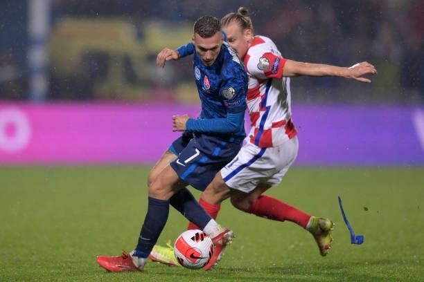 Lukas Haraslin of Slovakia in action against Domagoj Vida of Croatia during the 2022 FIFA World Cup Group H Qualifier match between Croatia and...
