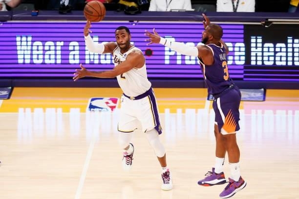 Chris Paul of the Phoenix Suns plays defense on Wayne Ellington of the Los Angeles Lakers during a preseason game on October 10, 2021 at STAPLES...