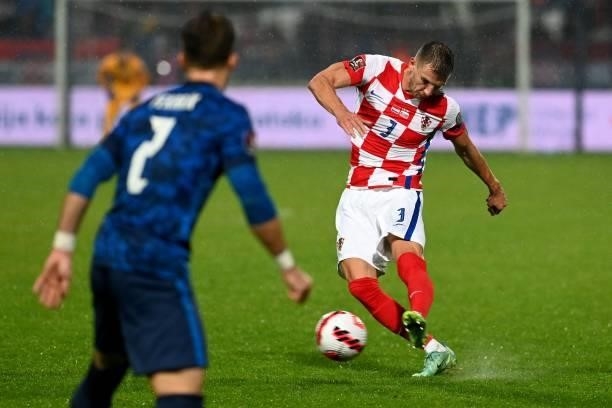 Croatia's defender Borna Barisic shoots to the goal during the FIFA World Cup Qatar 2022 qualification Group H football match between Croatia and...