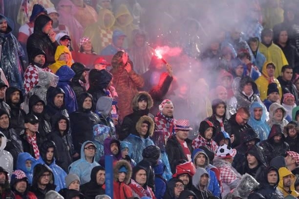 Croatia fans light up flares during the 2022 FIFA World Cup Group H Qualifier match between Croatia and Slovakia at Gradski Vrt Stadium on October...