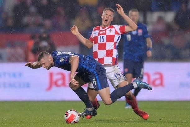 Milan Skriniar of Slovakia in action against Mario Pasalic of Croatia during the 2022 FIFA World Cup Group H Qualifier match between Croatia and...