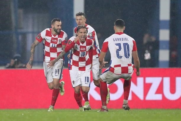Luka Modric of Croatia and teammates celebrate a goal during the 2022 FIFA World Cup Group H Qualifier match between Croatia and Slovakia at Gradski...