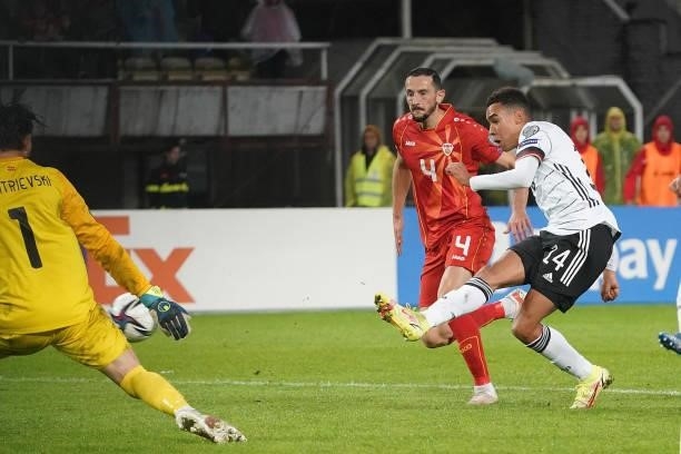 Jamal Musiala of Germany scores his team's fourth goal during the 2022 FIFA World Cup Qualifier match between North Macedonia and Germany at National...