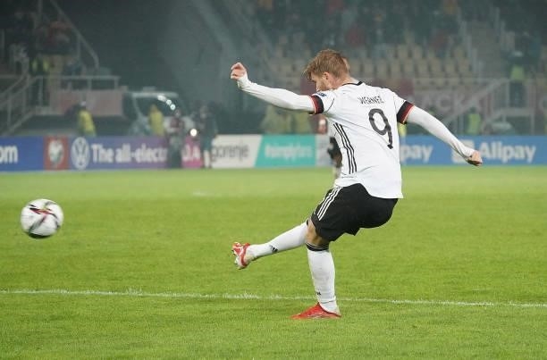 Timo Werner of Germany scores his team's third goal during the 2022 FIFA World Cup Qualifier match between North Macedonia and Germany at National...