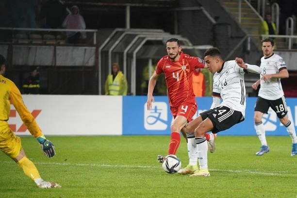 Jamal Musiala of Germany scores his team's fourth goal during the 2022 FIFA World Cup Qualifier match between North Macedonia and Germany at National...