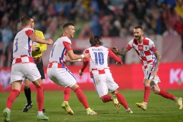 Luka Modric of Croatia and Croatia teammates celebrate a goal during the 2022 FIFA World Cup Group H Qualifier match between Croatia and Slovakia at...