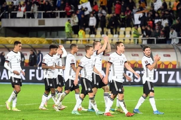 Germany's players celebrate their victory against North Macedonia during the FIFA World Cup Qatar 2022 qualification Group J football match between...