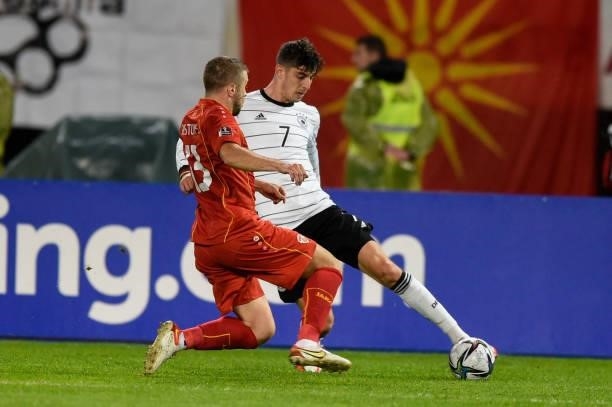 Germany's midfielder Kai Havertz vies with North Macedonia's defender Stefan Ristovski during the FIFA World Cup Qatar 2022 qualification Group J...