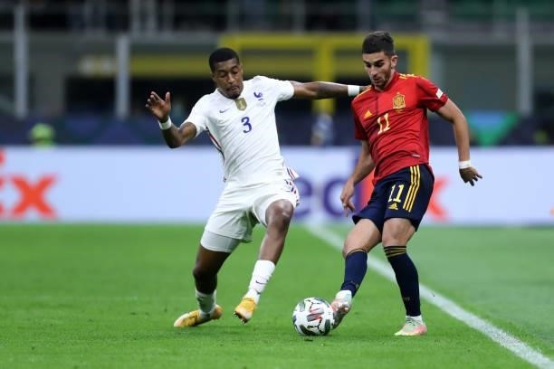 Presnel Kimpembe of France and Ferran Torres of Spain battle for the ball during the UEFA Nations League Final match between the Spain and France at...
