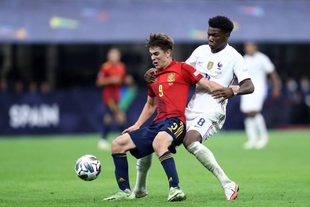 Aurelien Tchouameni of France and Pablo Gavi of Spain battle for the ball during the UEFA Nations League Final match between the Spain and France at...