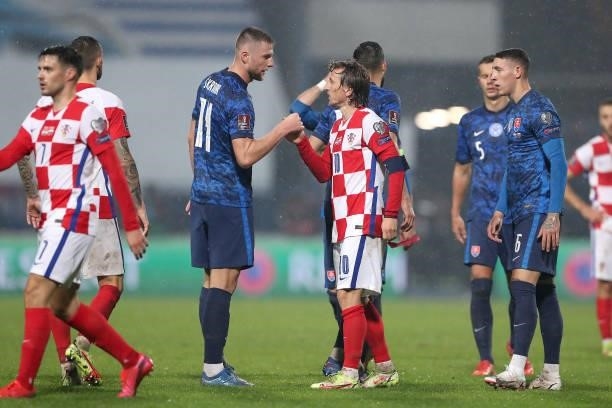 Luka Modric of Croatia shake hands with Milan Skriniar of Slovakia after the 2022 FIFA World Cup Group H Qualifier match between Croatia and Slovakia...