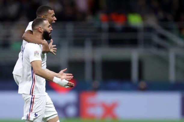 Karim Benzema of France and Kylian Mbappe of France celebrates after scoring his team's first goal with team mates during the UEFA Nations League...