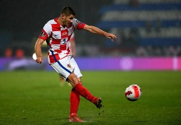Croatia's forward Andrej Kramaric kicks the ball during the FIFA World Cup Qatar 2022 qualification Group H football match between Croatia and...