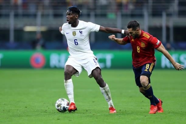 Paul Pogba of France and Jorge Koke of Spain battle for the ball during the UEFA Nations League Final match between the Spain and France at San Siro...