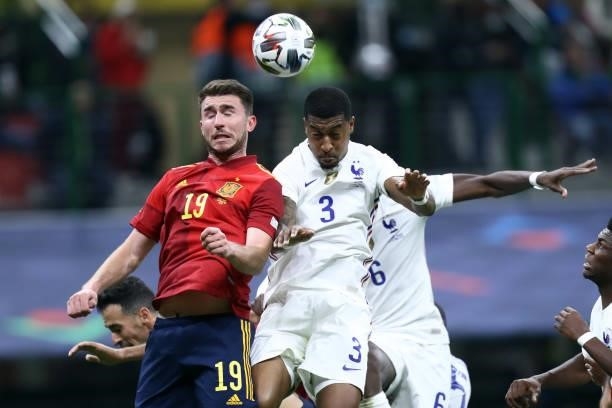 Presnel Kimpembe of France and Aymeric Laporte of Spain battle for the ball during the UEFA Nations League Final match between the Spain and France...