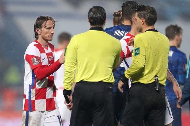 Luka Modric of Croatia shake hands with Referee Ovidiu Hategan after the 2022 FIFA World Cup Group H Qualifier match between Croatia and Slovakia at...