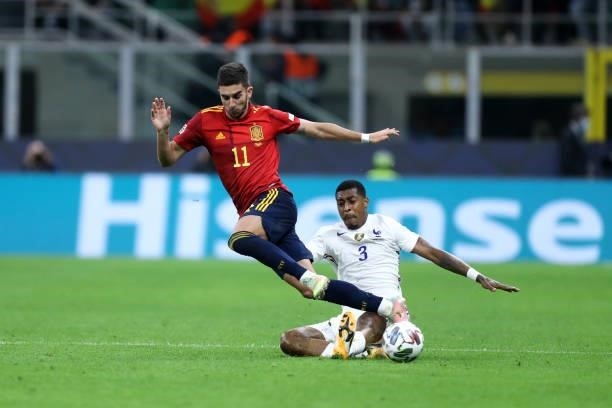 Presnel Kimpembe of France and Ferran Torres of Spain battle for the ball during the UEFA Nations League Final match between the Spain and France at...