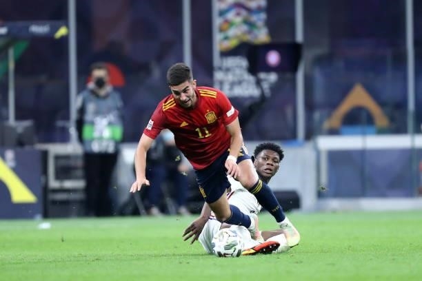 Ferran Torres of Spain and Aurelien Tchouameni of France controls the ball during the UEFA Nations League Final match between the Spain and France at...