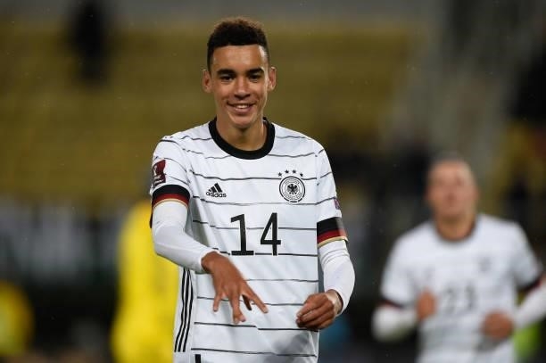 Germany's forward Jamal Musiala celebrates scoring his team's fourth goal during the FIFA World Cup Qatar 2022 qualification Group J football match...