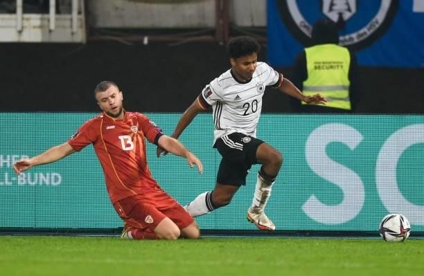 Germany's midfielder Karim Adeyemi controls the ball during the FIFA World Cup Qatar 2022 qualification Group J football match between North...