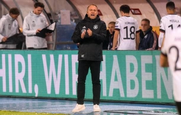 Germany's head coach Hans-Dieter Flick reacts on the sideline during the FIFA World Cup Qatar 2022 qualification group J football match between North...