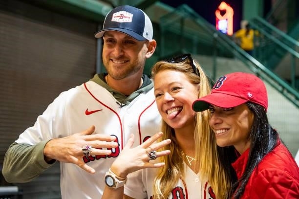 Former third baseman Will Middlebrooks of the Boston Red Sox and his wife Jenny Dell greet survivors of the Boston Marathon bombing before throwing...