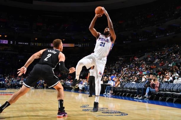 Joel Embiid of the Philadelphia 76ers shoots the ball against the Brooklyn Nets during a preseason game on October 11, 2021 at Wells Fargo Center in...