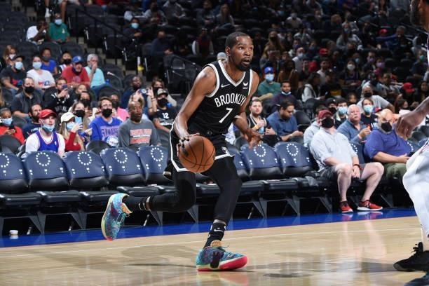 Kevin Durant of the Brooklyn Nets handles the ball against the Philadelphia 76ers during a preseason game on October 11, 2021 at Wells Fargo Center...