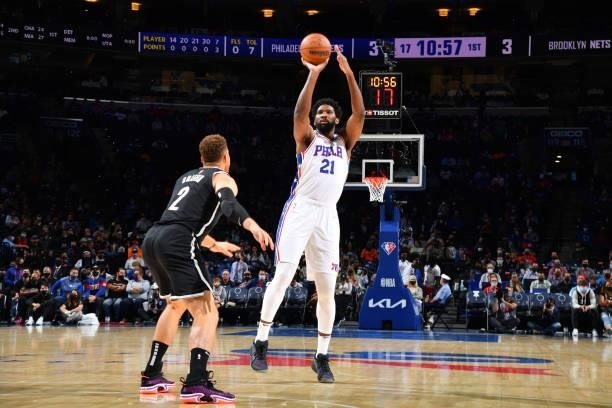 Joel Embiid of the Philadelphia 76ers shoots a three-pointer against the Brooklyn Nets during a preseason game on October 11, 2021 at Wells Fargo...
