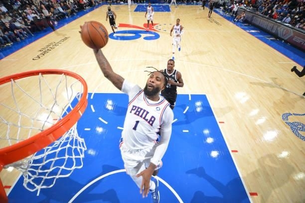 Andre Drummond of the Philadelphia 76ers dunks the ball against the Brooklyn Nets during a preseason game on October 11, 2021 at Wells Fargo Center...