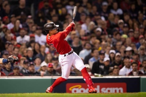 Enrique Hernandez of the Boston Red Sox hits a single during the seventh inning of game four of the 2021 American League Division Series against the...