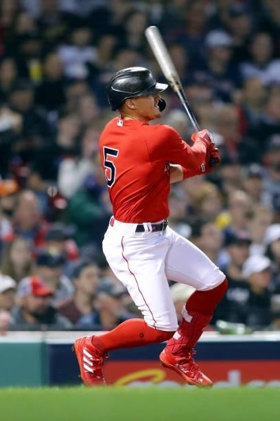Enrique Hernández of the Boston Red Sox hits a single in the bottom of the seventh inning during Game 4 of the ALDS between the Tampa Bay Rays and...