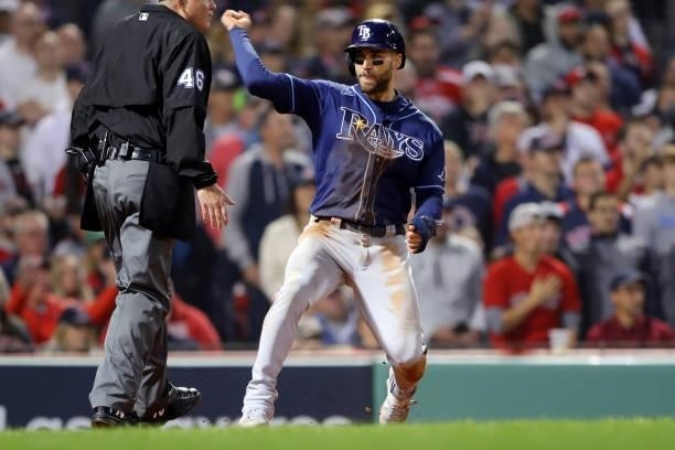 Kevin Kiermaier of the Tampa Bay Rays celebrates after scoring a run in the top of the eighth of inning during Game 4 of the ALDS between the Tampa...