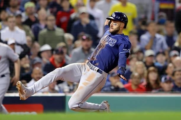 Kevin Kiermaier of the Tampa Bay Rays slides safely into home in the top of the eighth of inning during Game 4 of the ALDS between the Tampa Bay Rays...