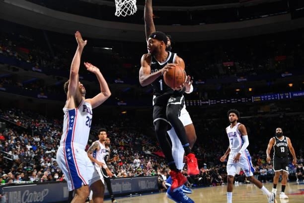 Bruce Brown of the Brooklyn Nets passes the ball against the Philadelphia 76ers during a preseason game on October 11, 2021 at Wells Fargo Center in...