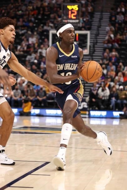 Kira Lewis Jr. #13 of the New Orleans Pelicans looks to pass the ball during a preseason game against the Utah Jazz on October 11, 2021 at Vivint...