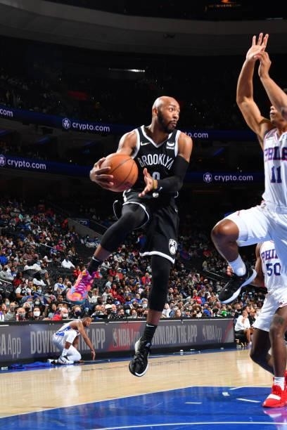Jevon Carter of the Brooklyn Nets passes the ball against the Philadelphia 76ers during a preseason game on October 11, 2021 at Wells Fargo Center in...