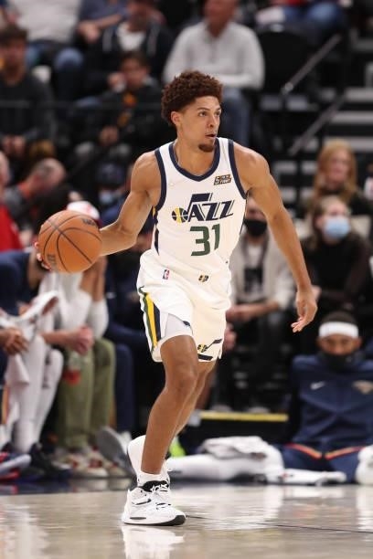 MaCio Teague of the Utah Jazz handles the ball during a preseason game against the New Orleans Pelicans on October 11, 2021 at Vivint Arena in Salt...