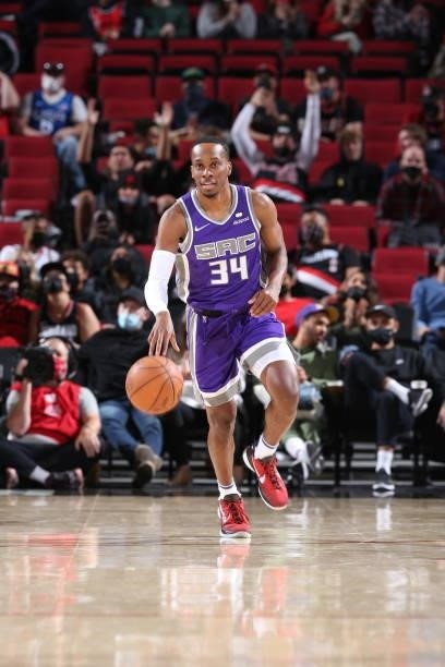 Matt Coleman III of the Sacramento Kings dribbles the ball during a preseason game against the Portland Trail Blazers on October 11, 2021 at the Moda...