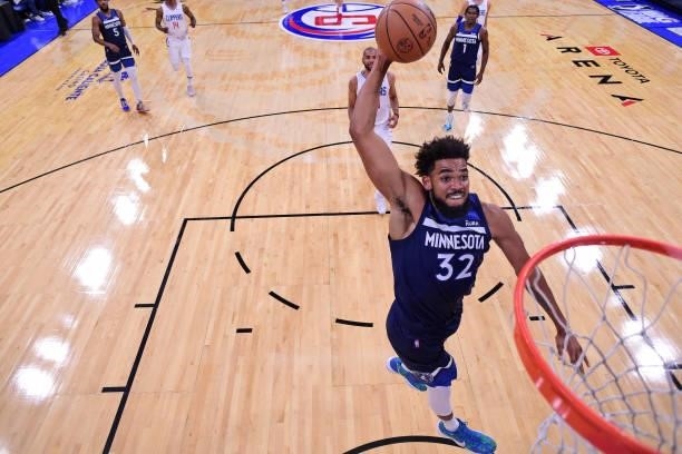 Karl-Anthony Towns of the Minnesota Timberwolves dunks the ball during a preseason game against the LA Clippers on October 11, 2021 at Toyota Arena...