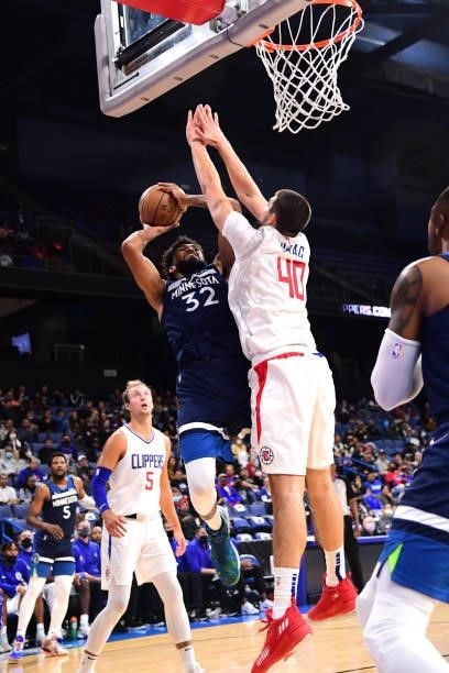 Karl-Anthony Towns of the Minnesota Timberwolves drives to the basket during a preseason game against the LA Clippers on October 11, 2021 at Toyota...