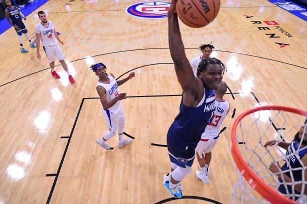 Anthony Edwards of the Minnesota Timberwolves dunks the ball during a preseason game against the LA Clippers on October 11, 2021 at Toyota Arena in...