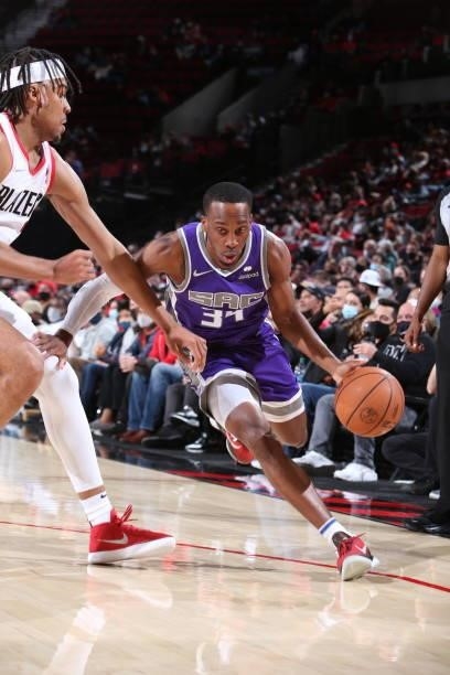 Matt Coleman III of the Sacramento Kings dribbles the ball during a preseason game against the Portland Trail Blazers on October 11, 2021 at the Moda...
