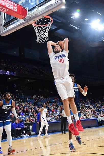 Ivica Zubac of the LA Clippers dunks the ball during a preseason game against the Minnesota Timberwolves on October 11, 2021 at Toyota Arena in...