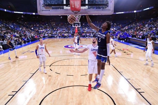 Jaden McDaniels of the Minnesota Timberwolves dunks the ball during a preseason game against the LA Clippers on October 11, 2021 at Toyota Arena in...