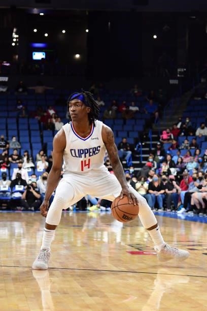 Terance Mann of the LA Clippers dribbles the ball during a preseason game against the Minnesota Timberwolves on October 11, 2021 at Toyota Arena in...