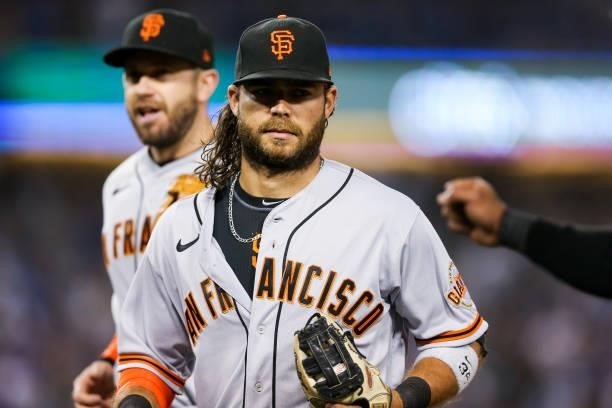 Brandon Crawford of the San Francisco Giants looks on after a catch in the seventh inning during Game 3 of the NLDS between the San Francisco Giants...